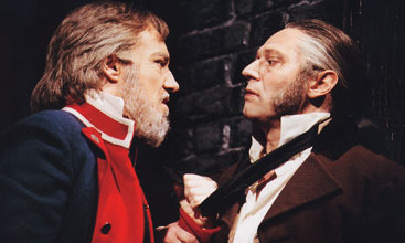 John Owen-Jones as Jean Valjean and Hans Peter Janssens as Javert